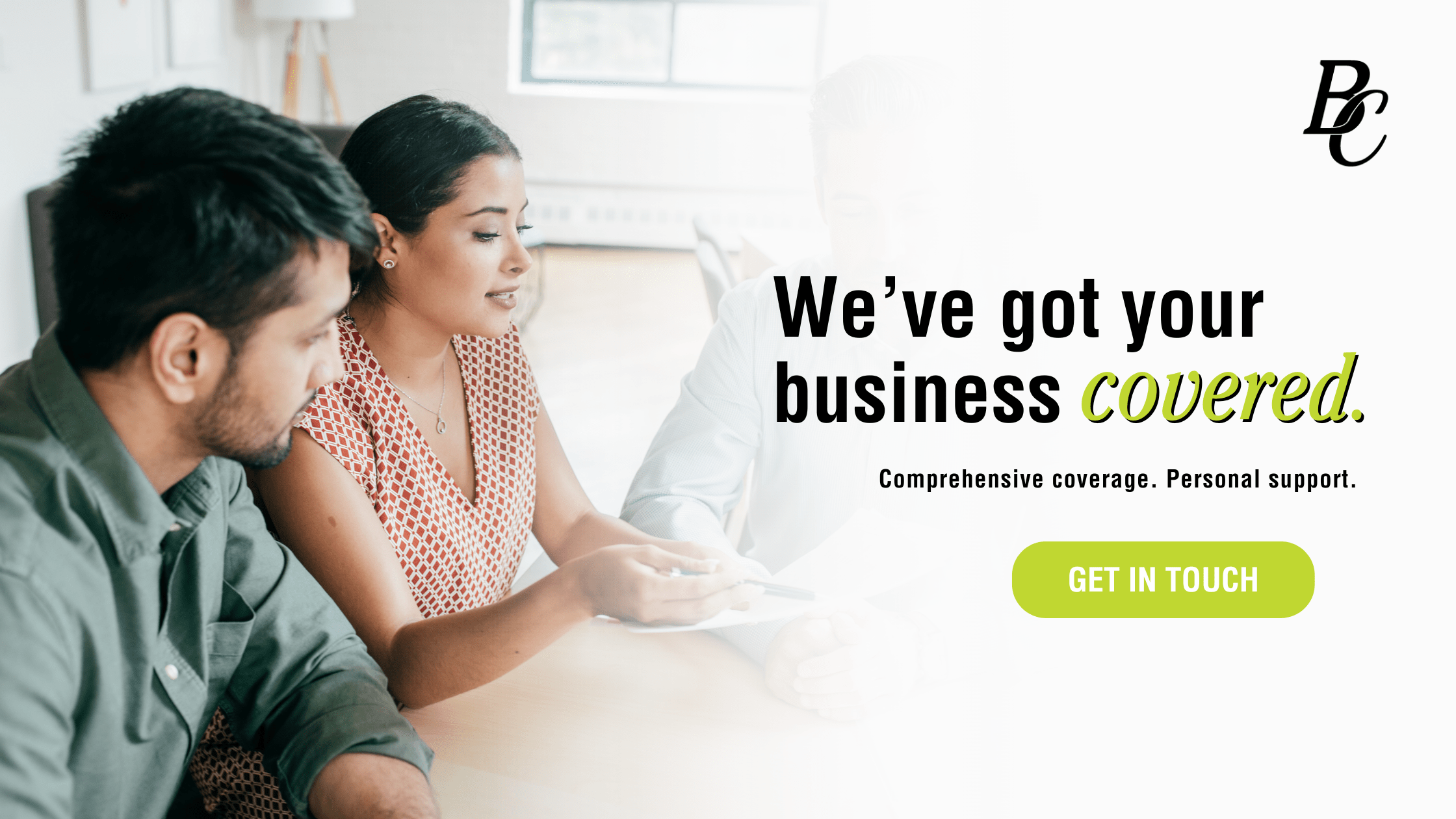 Business team reviewing insurance coverage options at a meeting — Bene-Care offers comprehensive coverage and personal support.