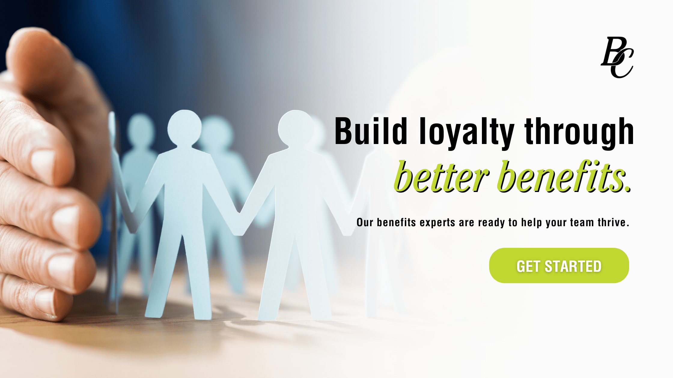 Business professional protecting paper cutout figures of employees, symbolizing teamwork and employee retention in Rochester NY through better benefits.